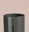Small black pot on stand