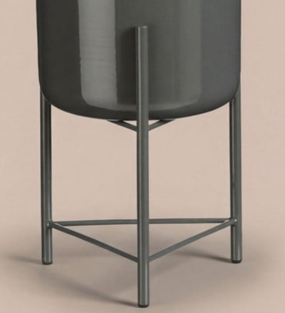 Small black pot on stand