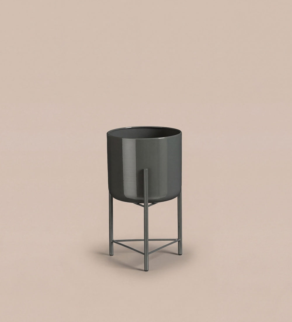 Small black pot on stand