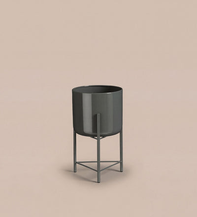 Small black pot on stand