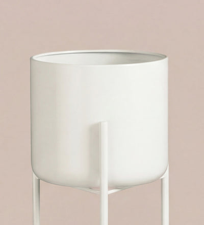 Large white pot on stand