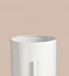 Small white pot on stand