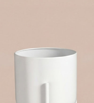 Small white pot on stand